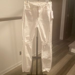 Woman’s size 32 white distress H&M skinny jeans